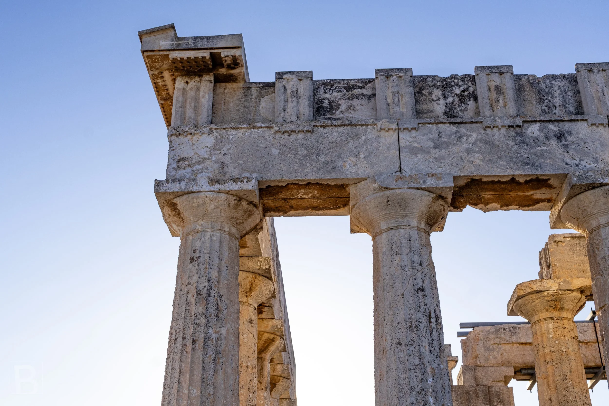 A simple opening between worn columns preserves the scale and
spatial order of a ruined sanctuary.