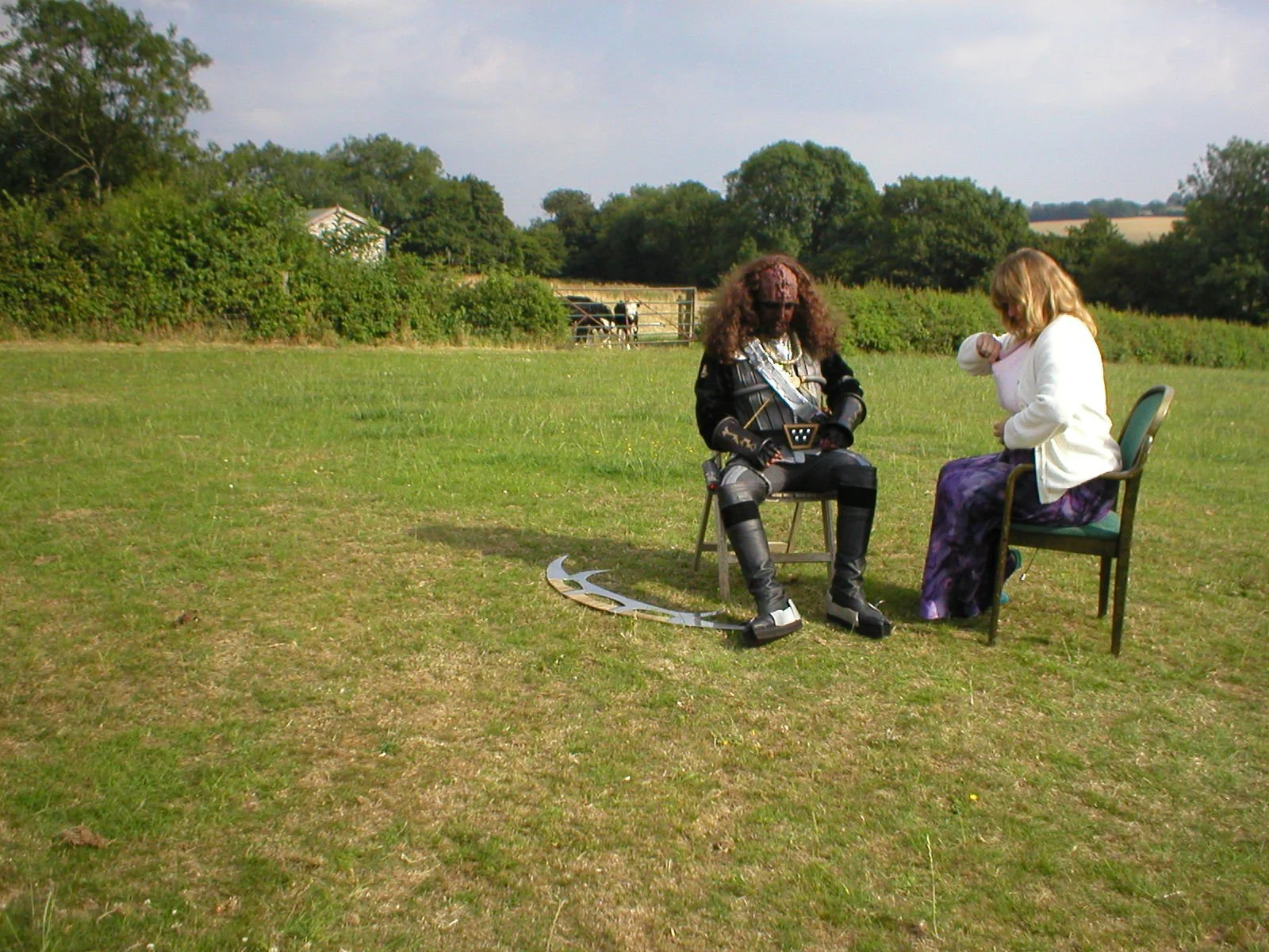 The picture is me with a Klingon filming for the Discovery Channel way back in time. I am not saying, "Check-out my boobs" I have lost the mic.
