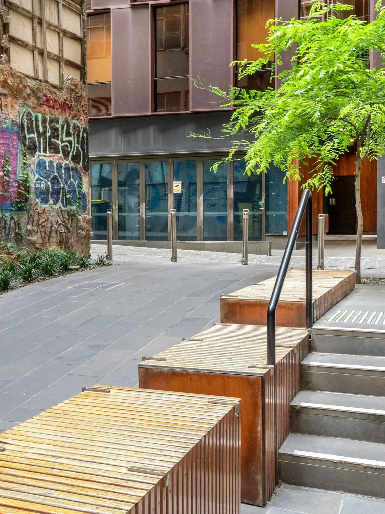 The exit to the alley is more wide open, creating greater connection to the urban fabric, providing seating spaces.
