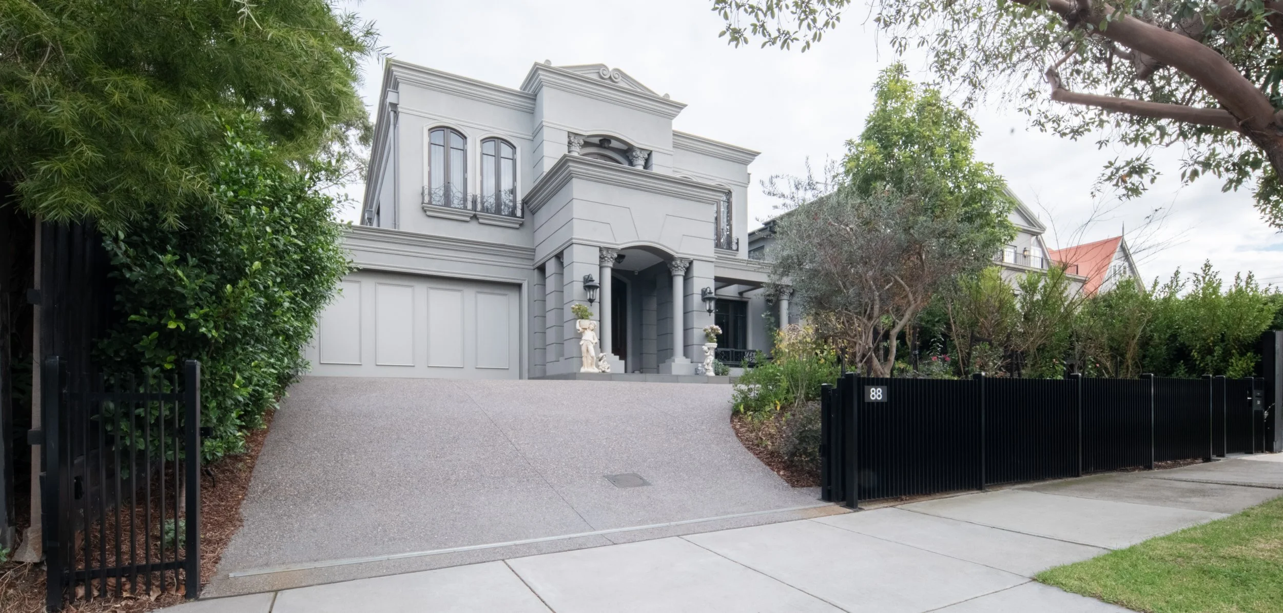 More photos showing this classy garden project, including details of the front fence, bluestone pavings, vegetations and the complexity and beauty of the backyard pool.