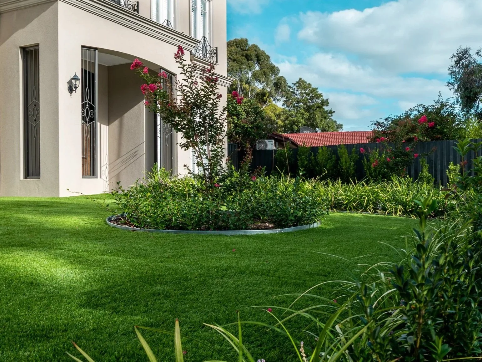 A garden with lush vegetations, the evergreen plantations giving out a green garden view.