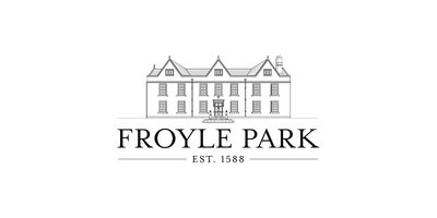 Black logo with the text 'Top Things' in a stylish font and 'EST. 2023' underneath.