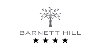 Barnett Hill logo featuring a stylized tree above the text 'Barnett Hill'