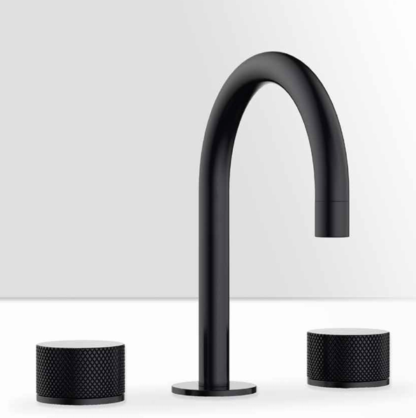 Modern black kitchen faucet with two black textured round speakers on a white surface.