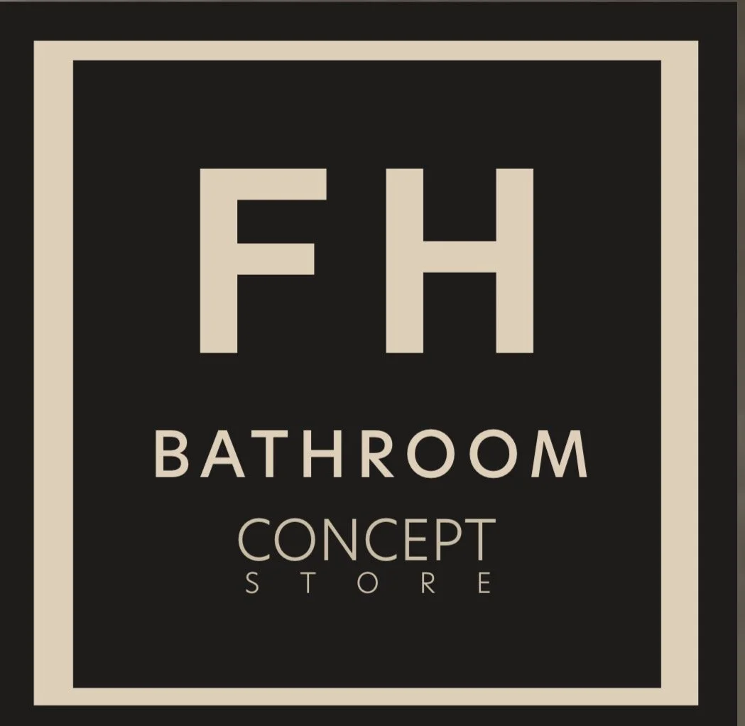 Sign for F H Bathroom Concept Store with black background and beige text.