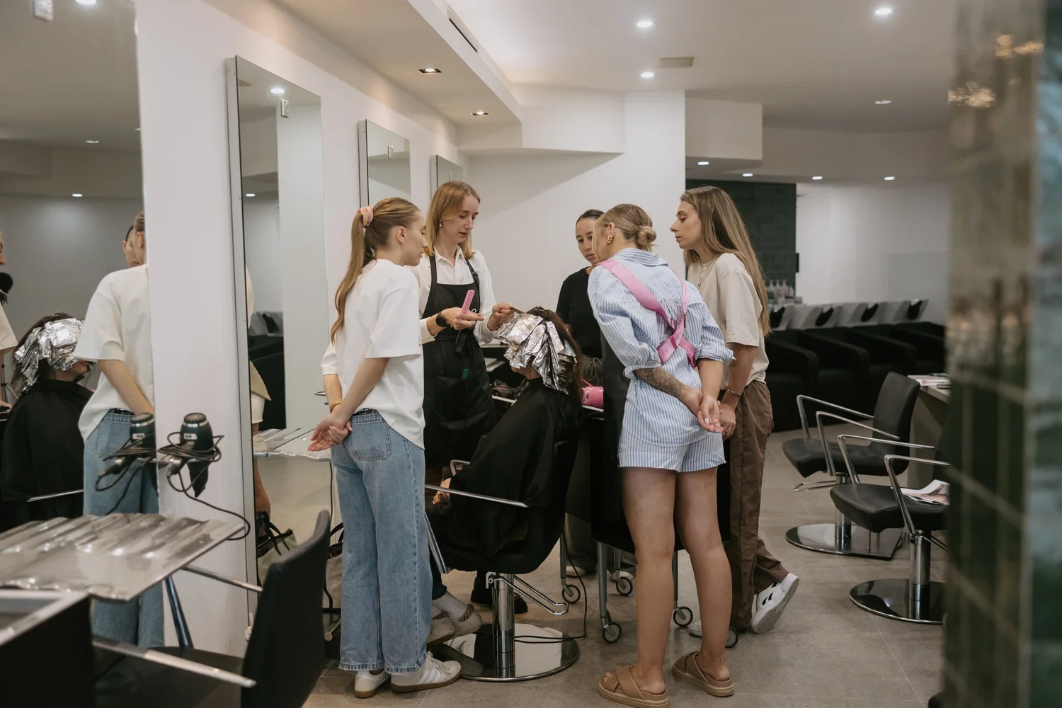 Kateryna teaching Air Touch in a salon