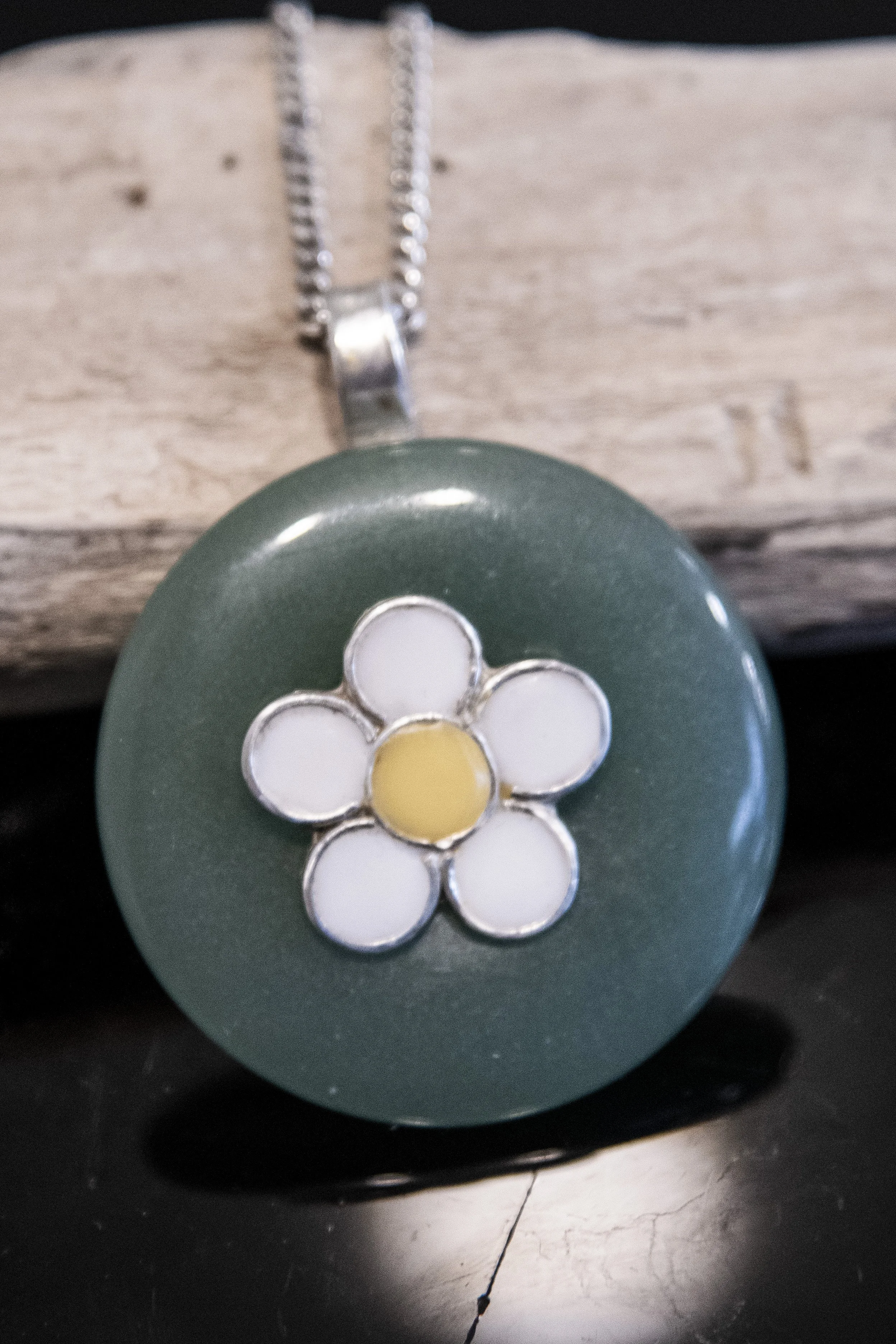 Grote Donut steen met zilveren bloem hart, eigen collectie.