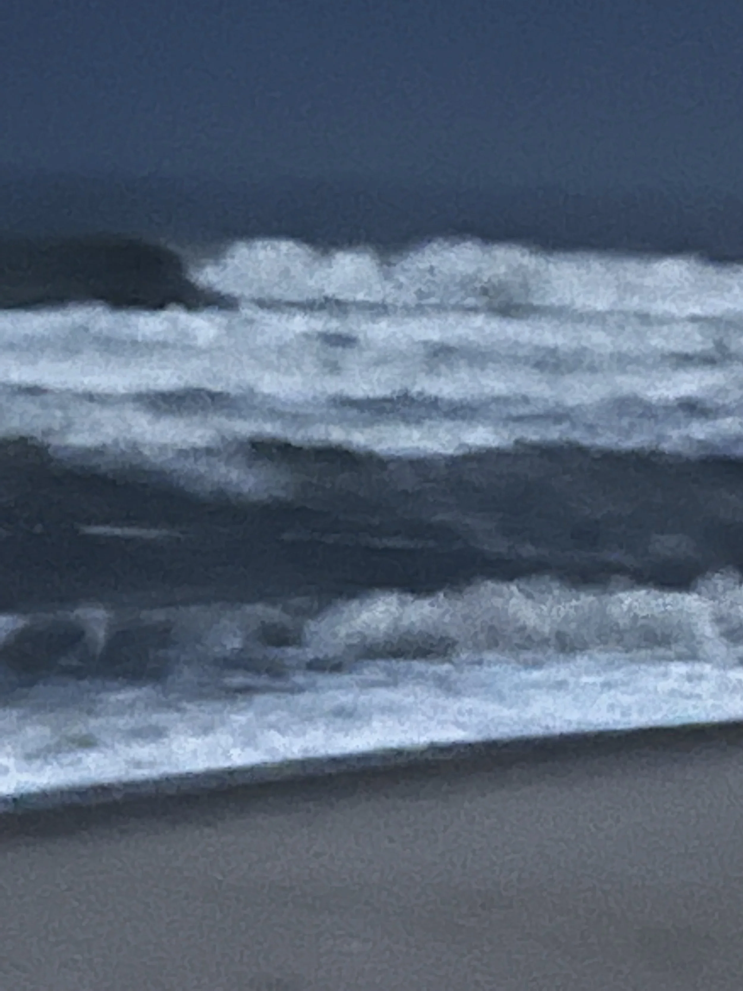 At the Edge of Light, Fire Island. Bands of white surf stacked across dark water at nightfall.