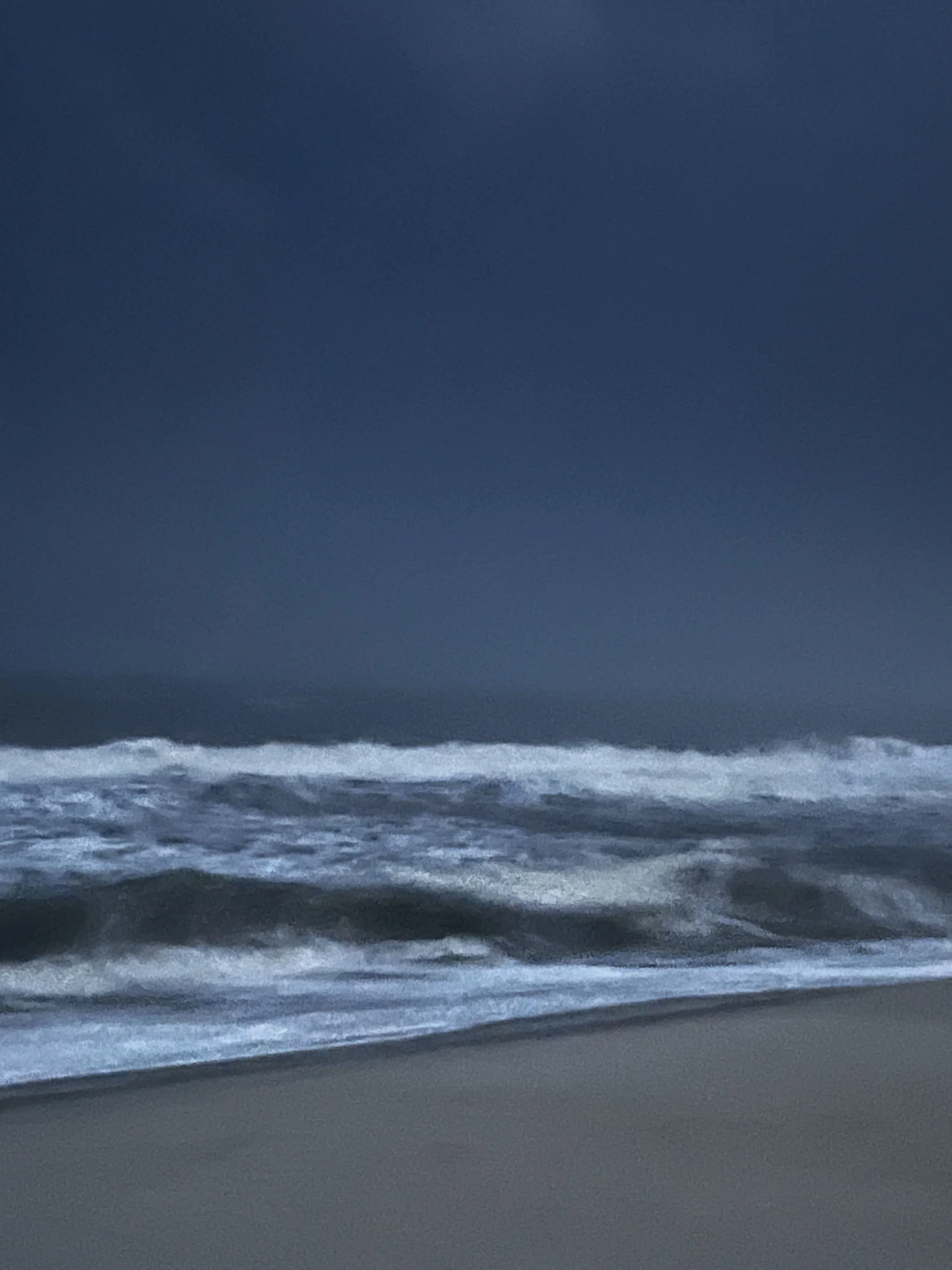 At the Edge of Light, Fire Island. Deep blue dusk above long ranks of white waves.