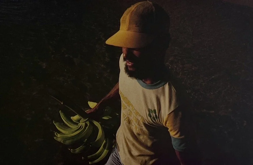Memories of Nicaragua. A man carrying green plantains between Big Corn Island and Little Corn Island, Nicaragua.