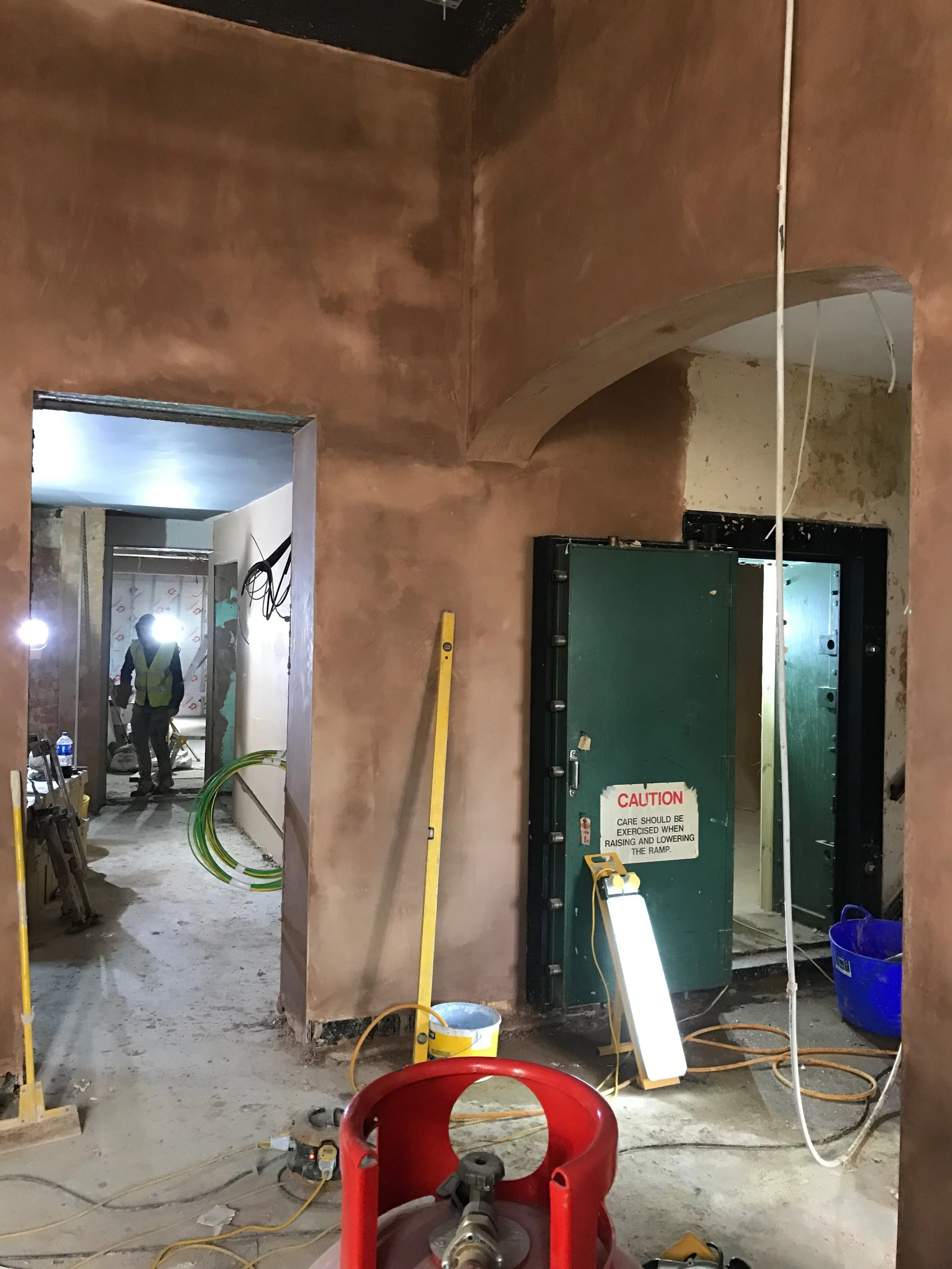 Re-plastering continues whilst other trades push on to meet our looming completion date.
