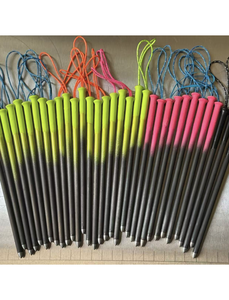 A collection of golf clubs with black shafts and neon-colored grips, arranged in rows, with colorful strings tied to the grips.