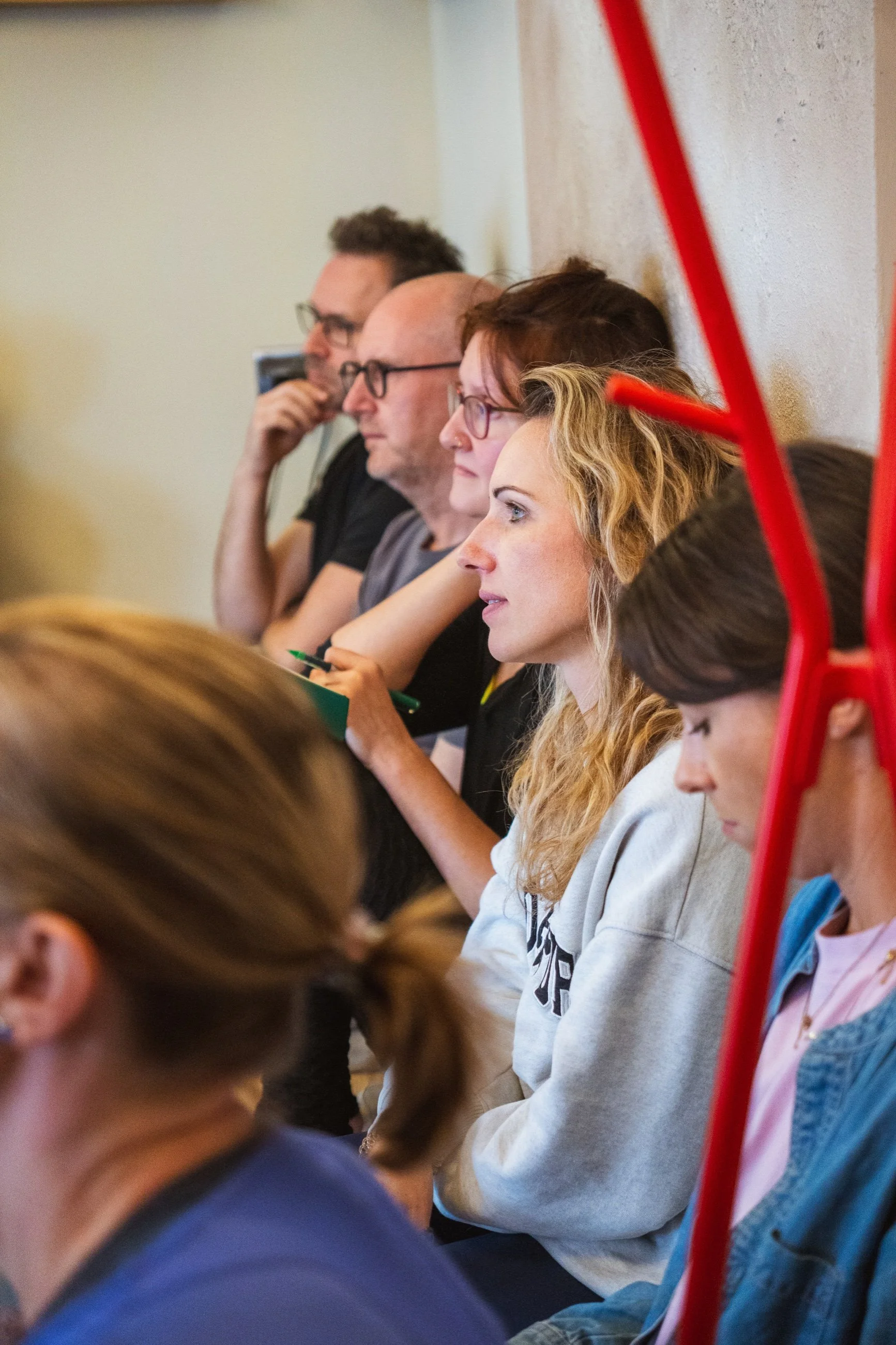 Participants listening during a Foundations of Balance session