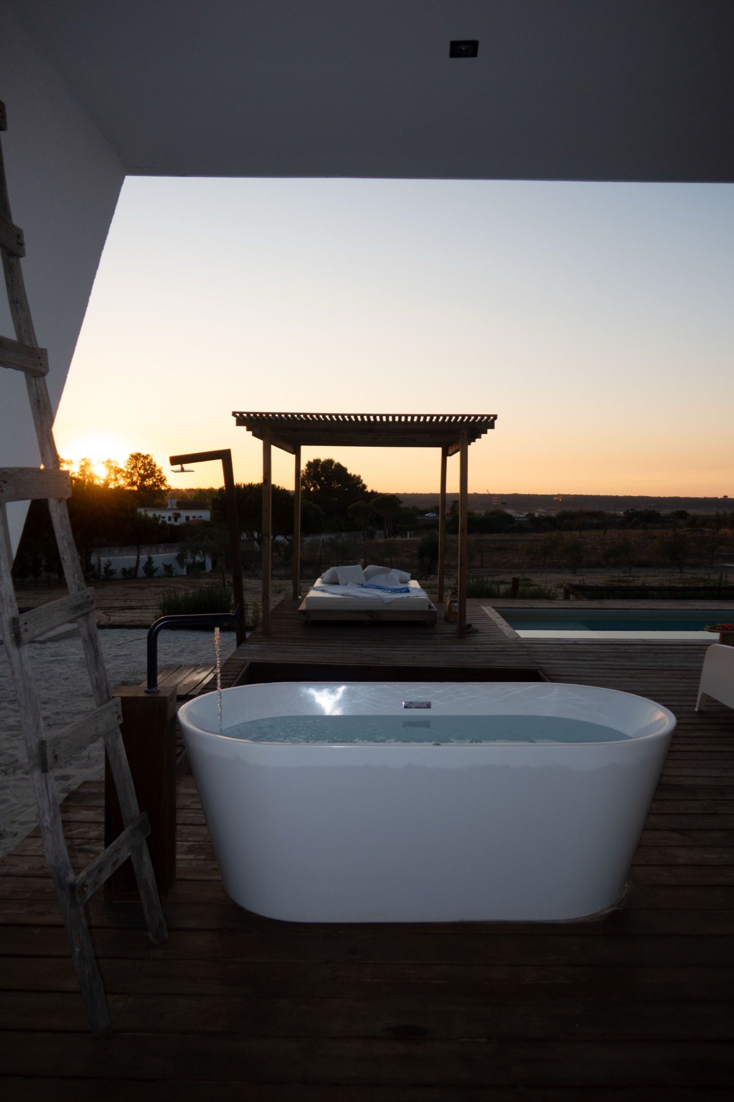 Hot tub and pool at sunset