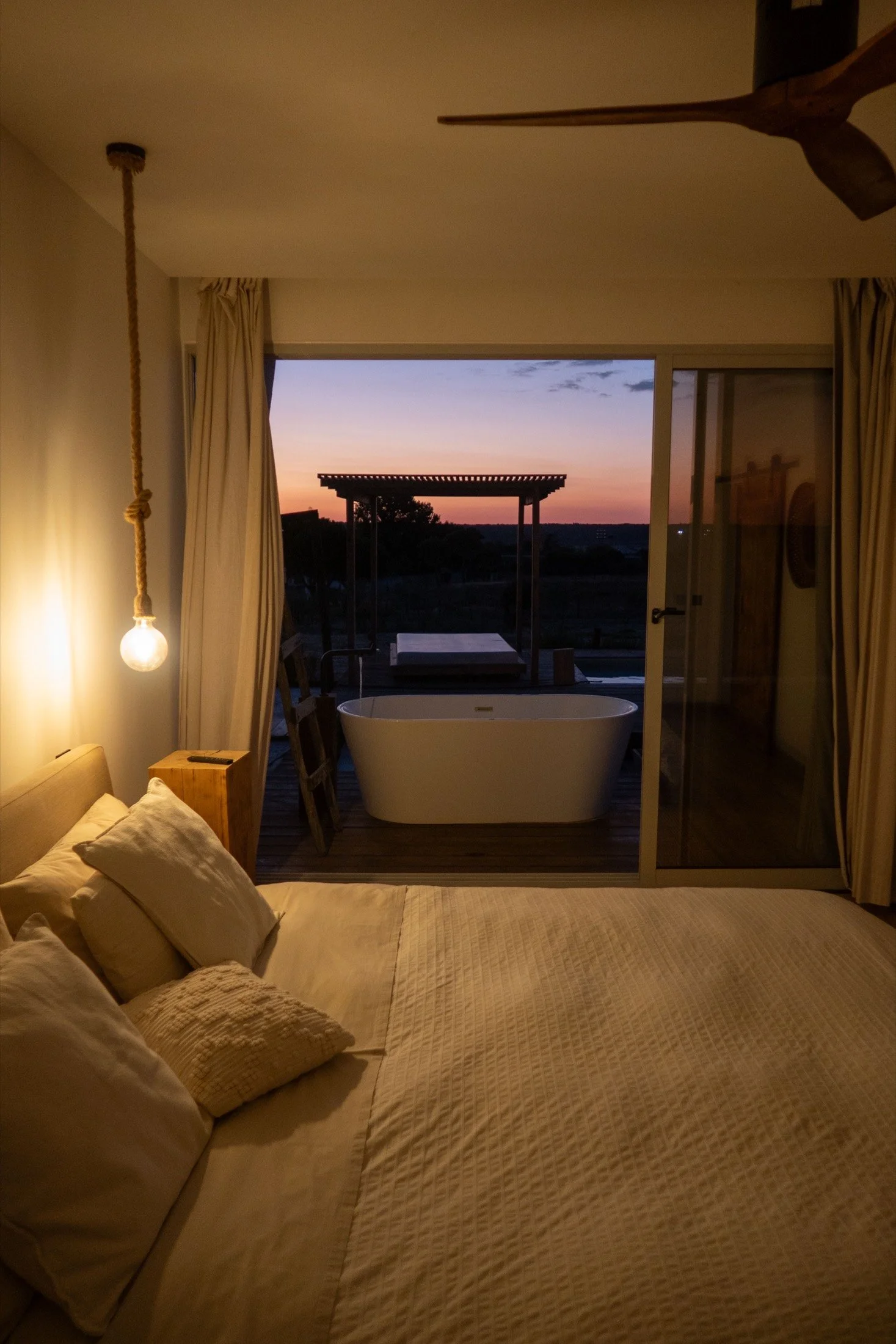 Bedroom looking out to the hot tub