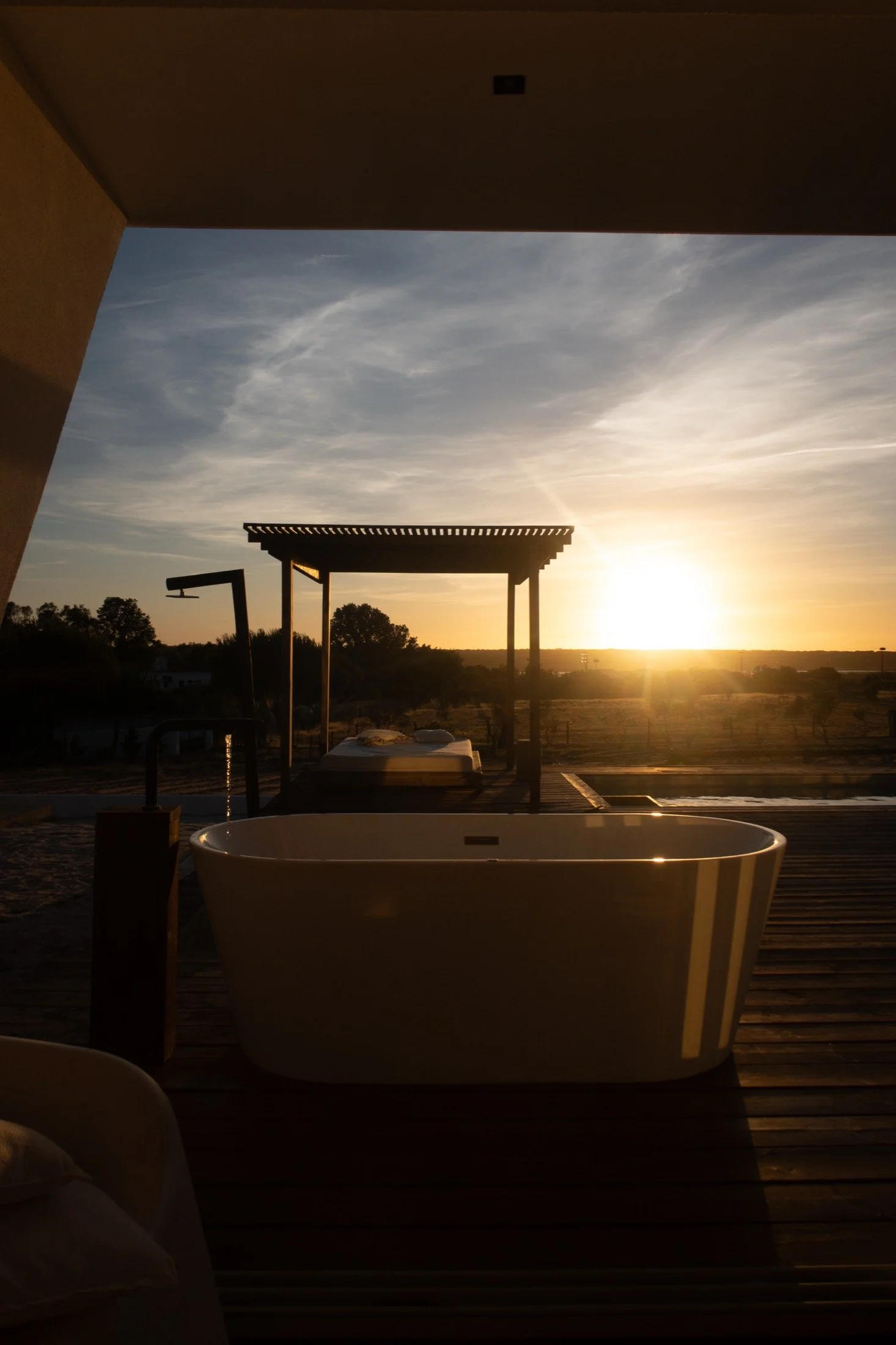 Hot tub and pergola at sunset