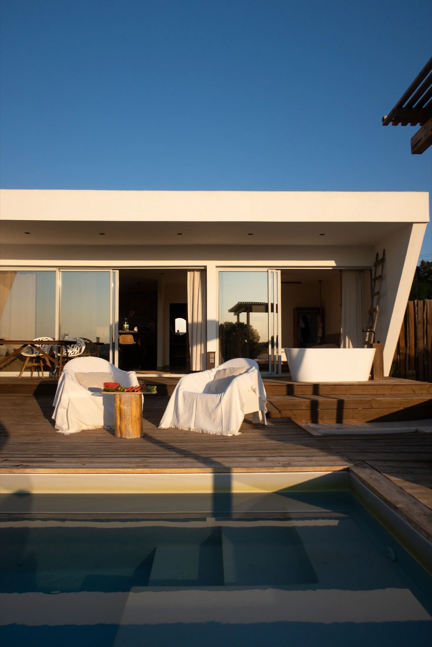 Terrace and pool at golden hour