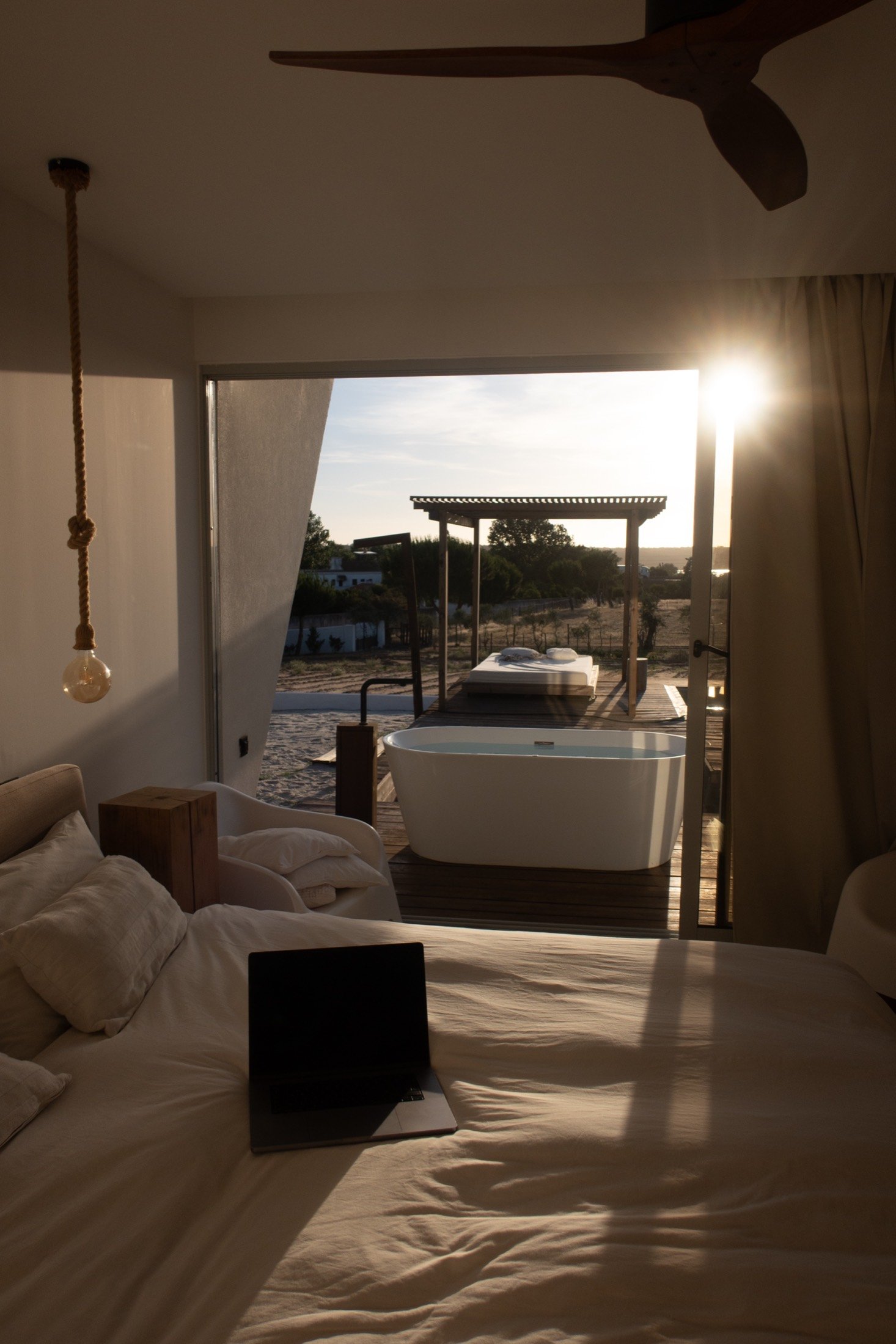 The bedroom opens onto the deck