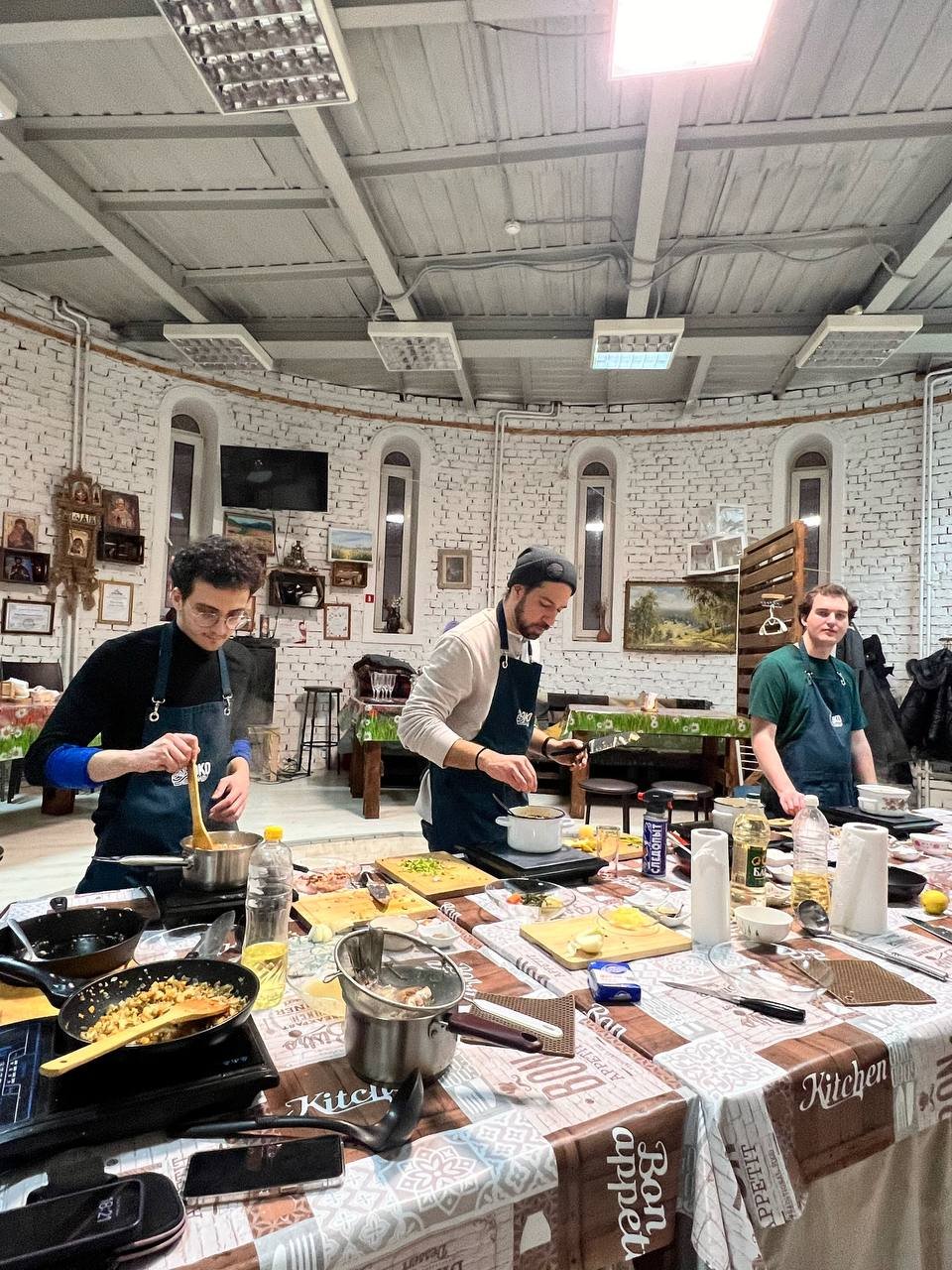 Group trip travellers at a cooking master class in Russia