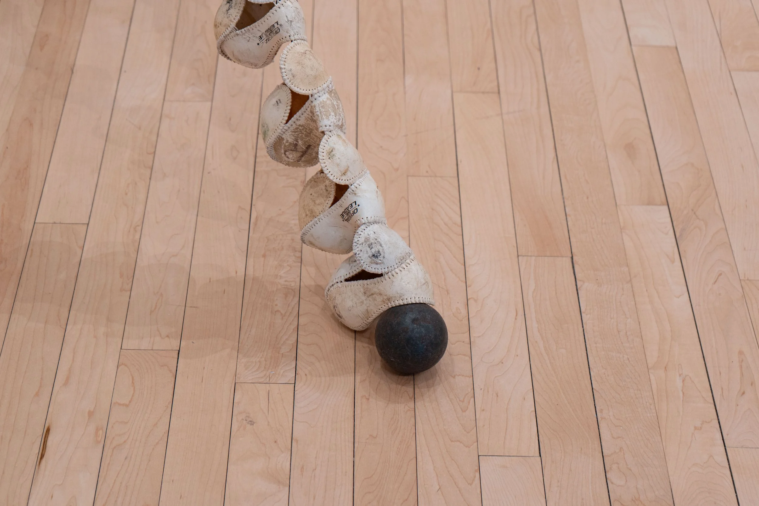   Spine —   Leather, silk, granite, steel, bearing balls, pine rosin, Darth Vader house key
 
Image courtesy of Priya Vaswani
