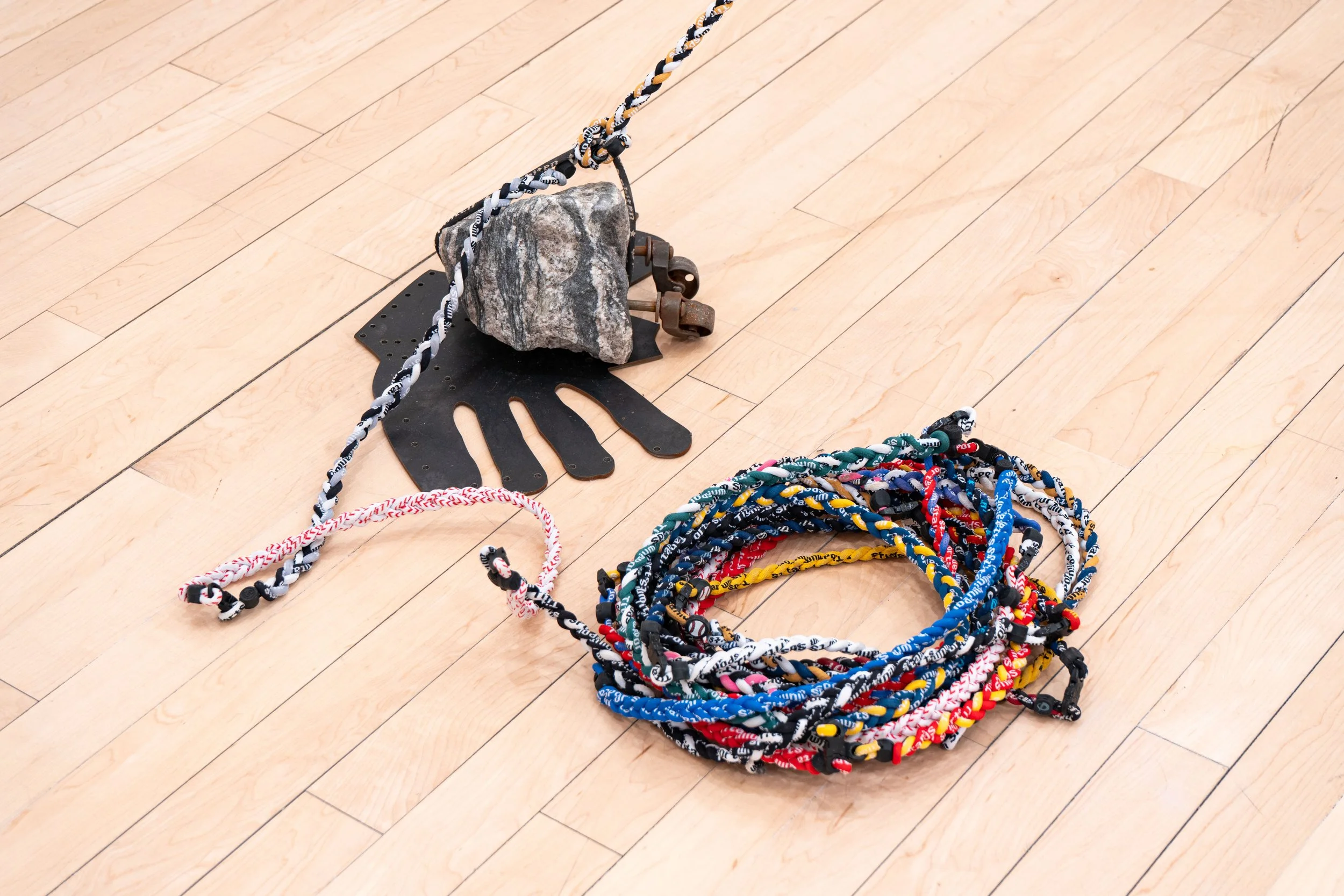   That’s no moon —   Steel, pine rosin, Death Star temporary tattoo, used titanium magnet braided necklaces, stone
 
Image courtesy of Priya Vaswani