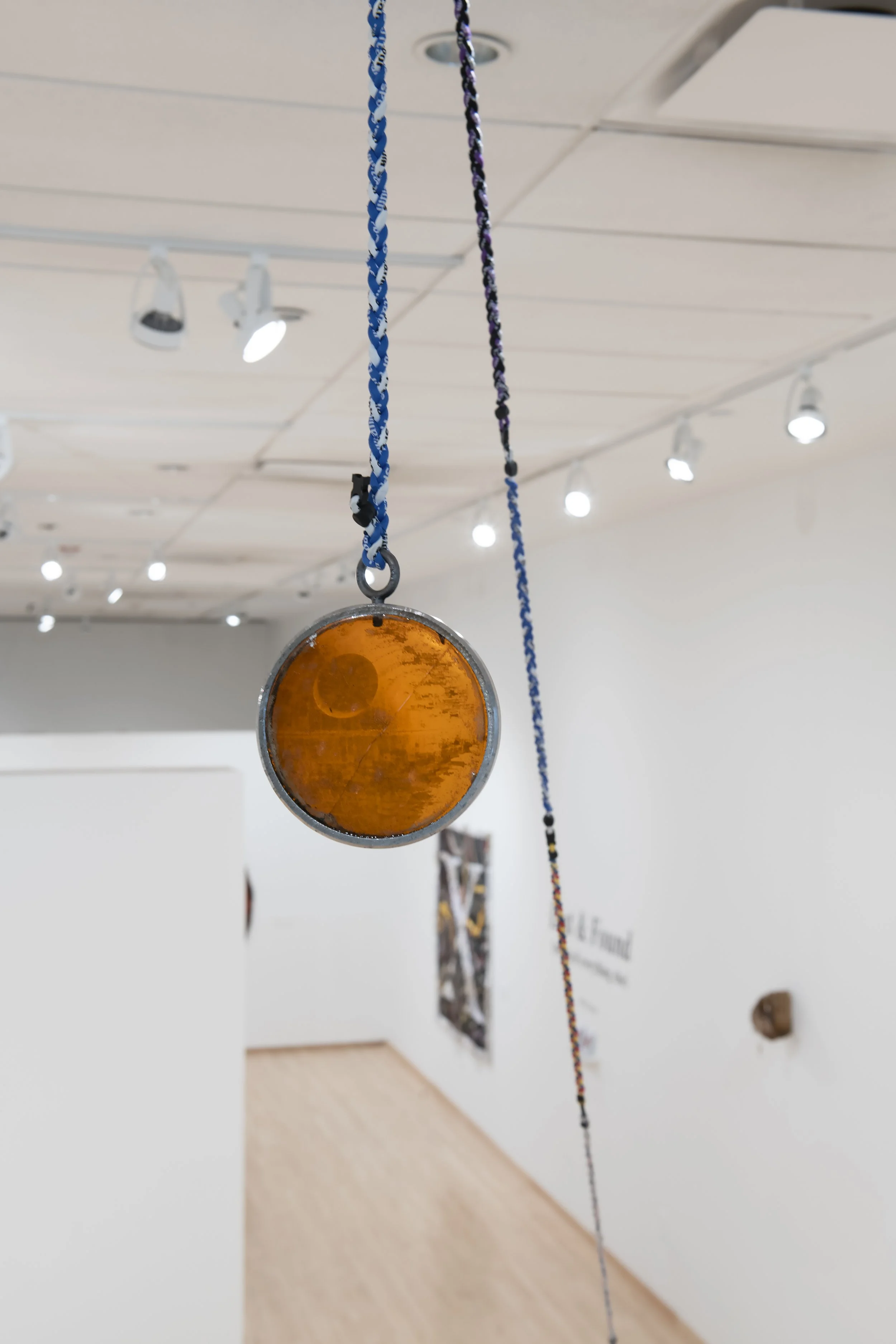  That’s no moon —   Steel, pine rosin, Death Star temporary tattoo, used titanium magnet braided necklaces, stone
 
Image courtesy of John Carlano