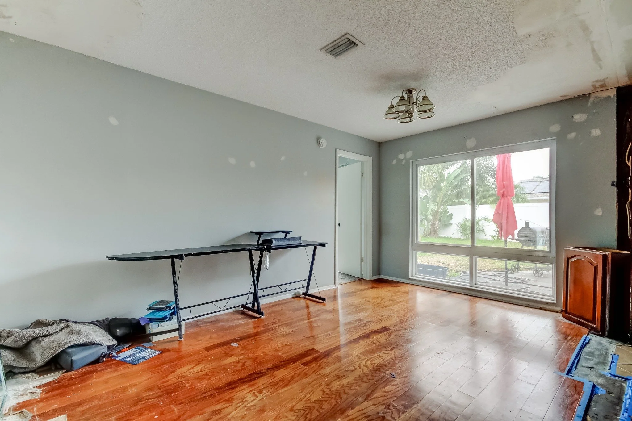 financially distressed dining room with abandoned furniture under construction