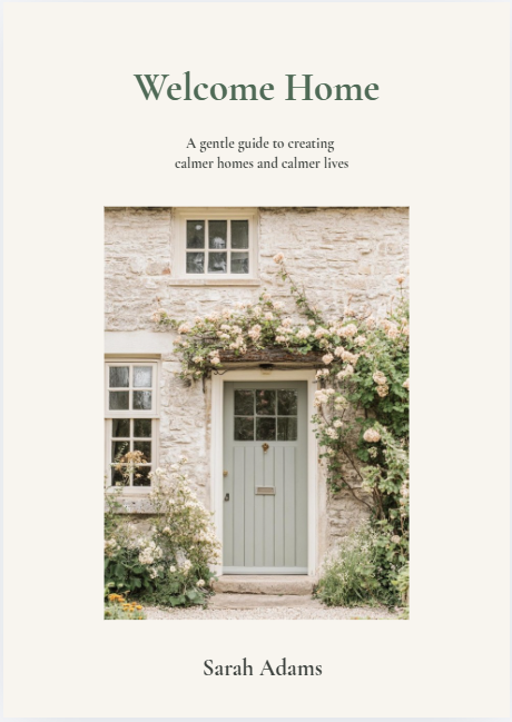 Cover of the Welcome Home guide by Sarah Adams, featuring a cottage doorway surrounded by flowers