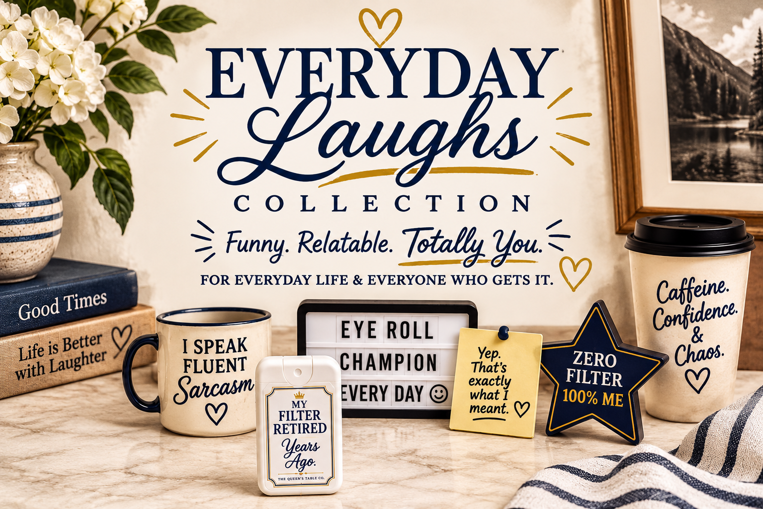 A decorative display with various mugs, signs, and books on a table, featuring the phrase 'Everyday Laughs Collection' and related humorous quotes about life, laughter, and coffee, set against a wall with a framed black-and-white mountain landscape.
