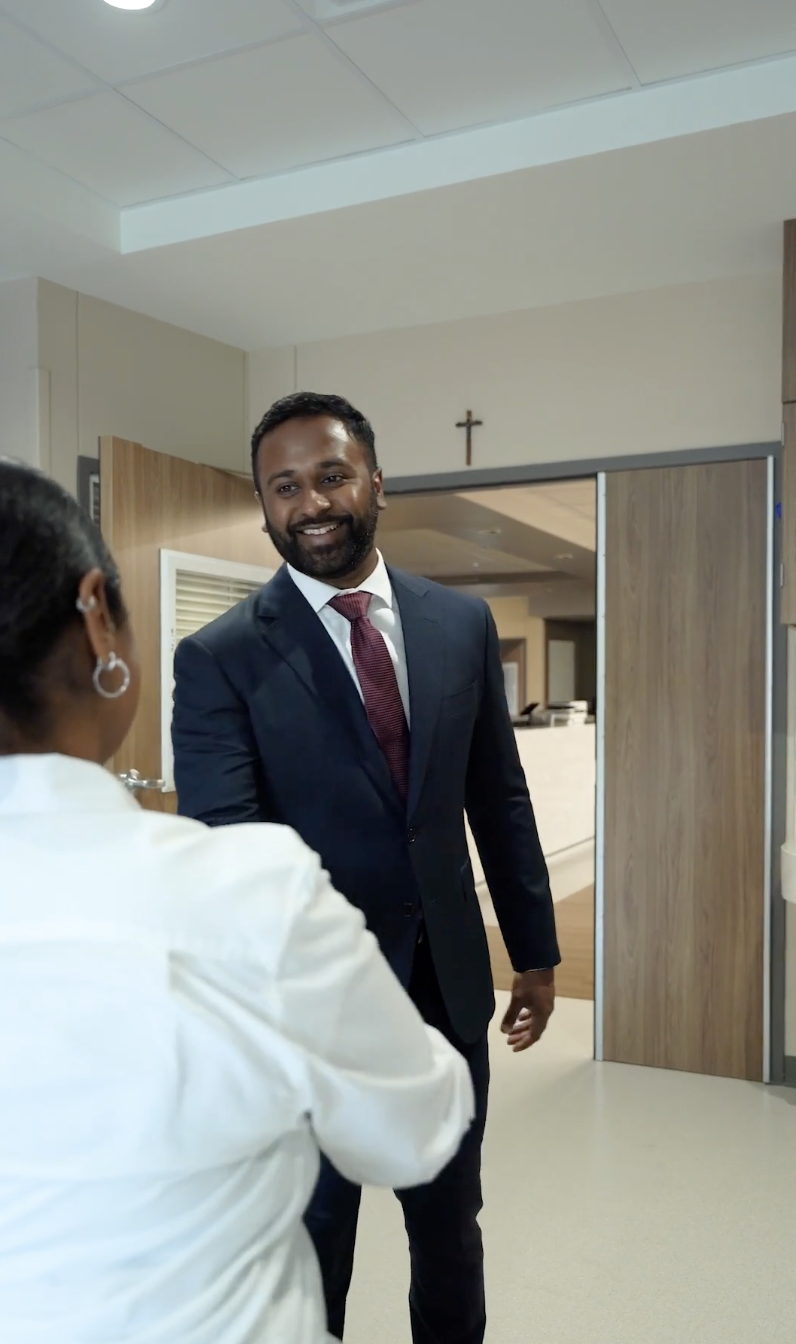 Spine consultation with a patient, Gautham Prabhakar, spine surgeon in San Antonio, Texas at Texas Neuro Spine