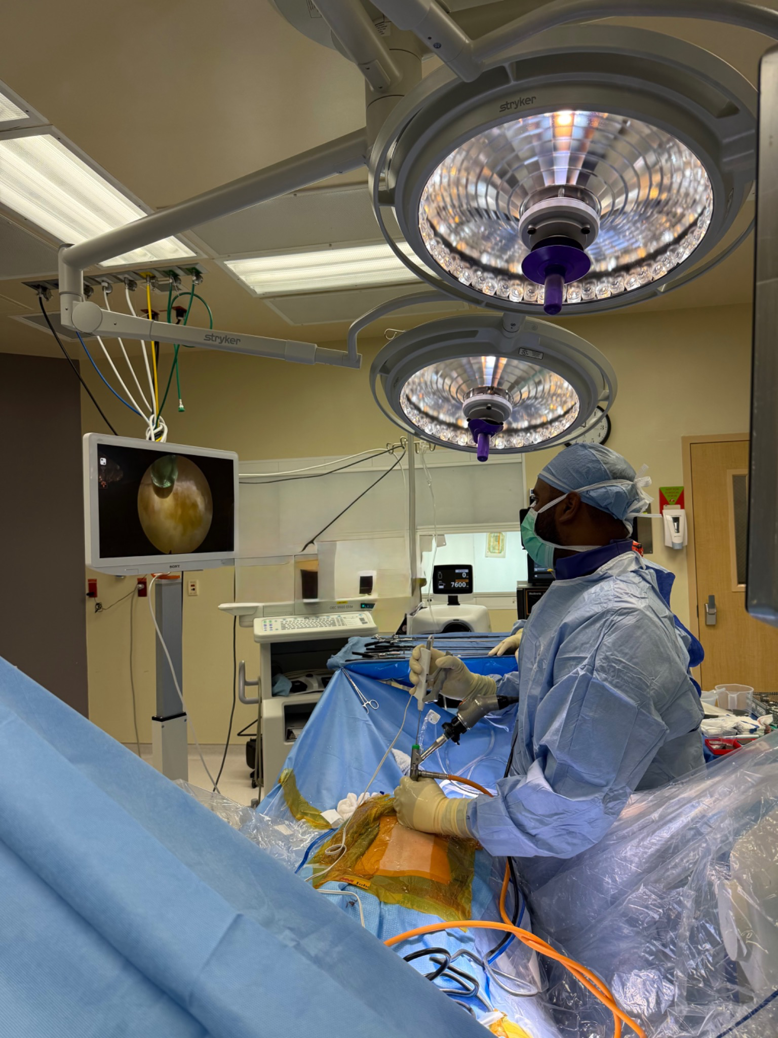 Performing minimally invasive spine surgery, Gautham Prabhakar, spine surgeon in San Antonio, Texas at Texas Neuro Spine