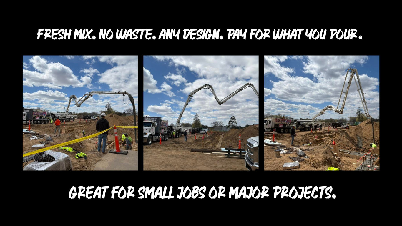 Construction site with concrete pump pouring concrete into a foundation with workers and trucks under a partly cloudy sky.
