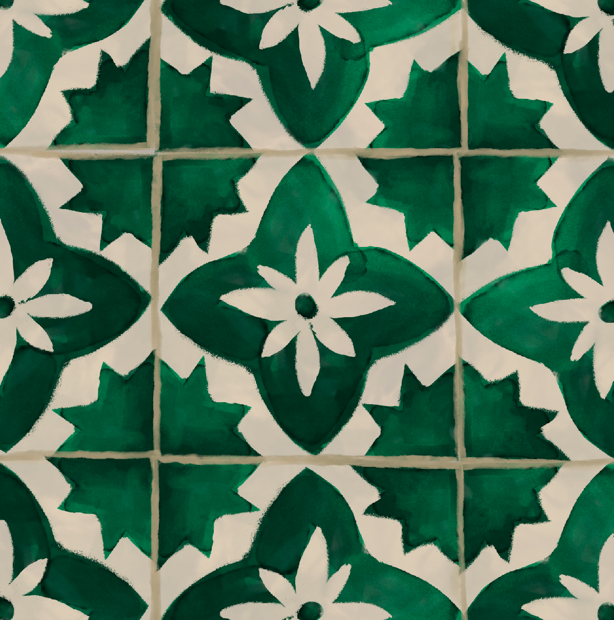 A pattern of green tiles with white floral and star shapes, arranged in a symmetrical repeating design.