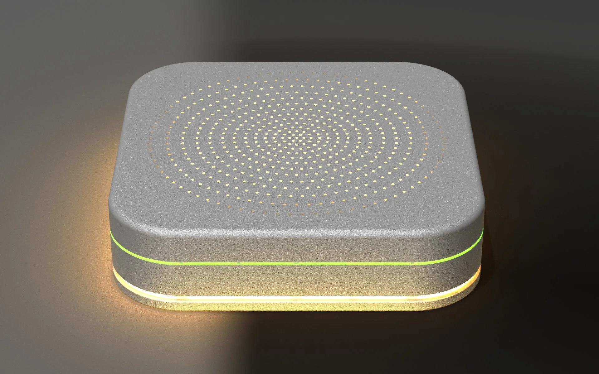 A modern, square-shaped electronic device with a perforated top surface displaying a spiral pattern of small yellow lights. The device is outlined with multicolored LED lights around its edges, creating a sleek, futuristic appearance.