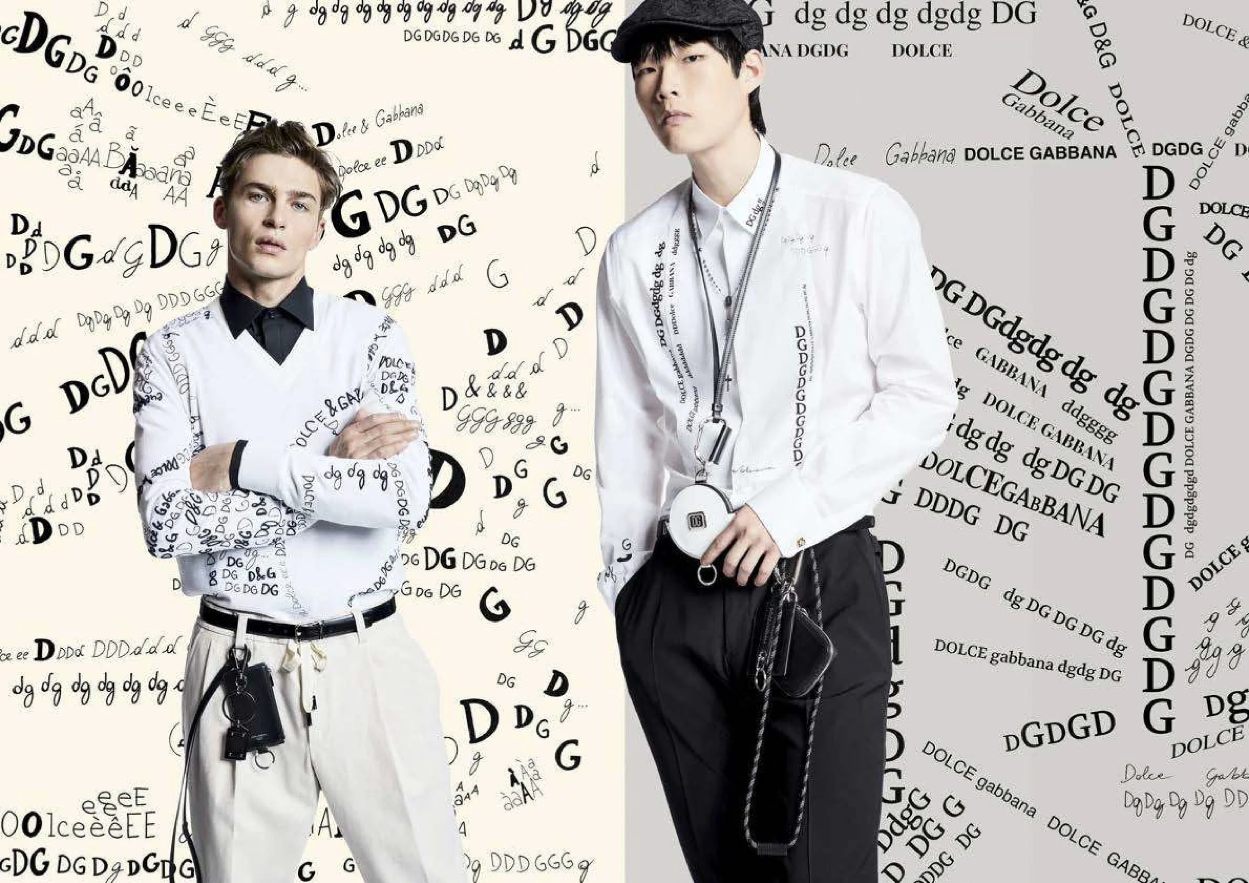 Two young men posing in front of a background filled with the repeated text 'Dolce Gabbana' and various letters and symbols. One is dressed in white with a black shirt and accessories, while the other wears black with a white shirt and a cap.