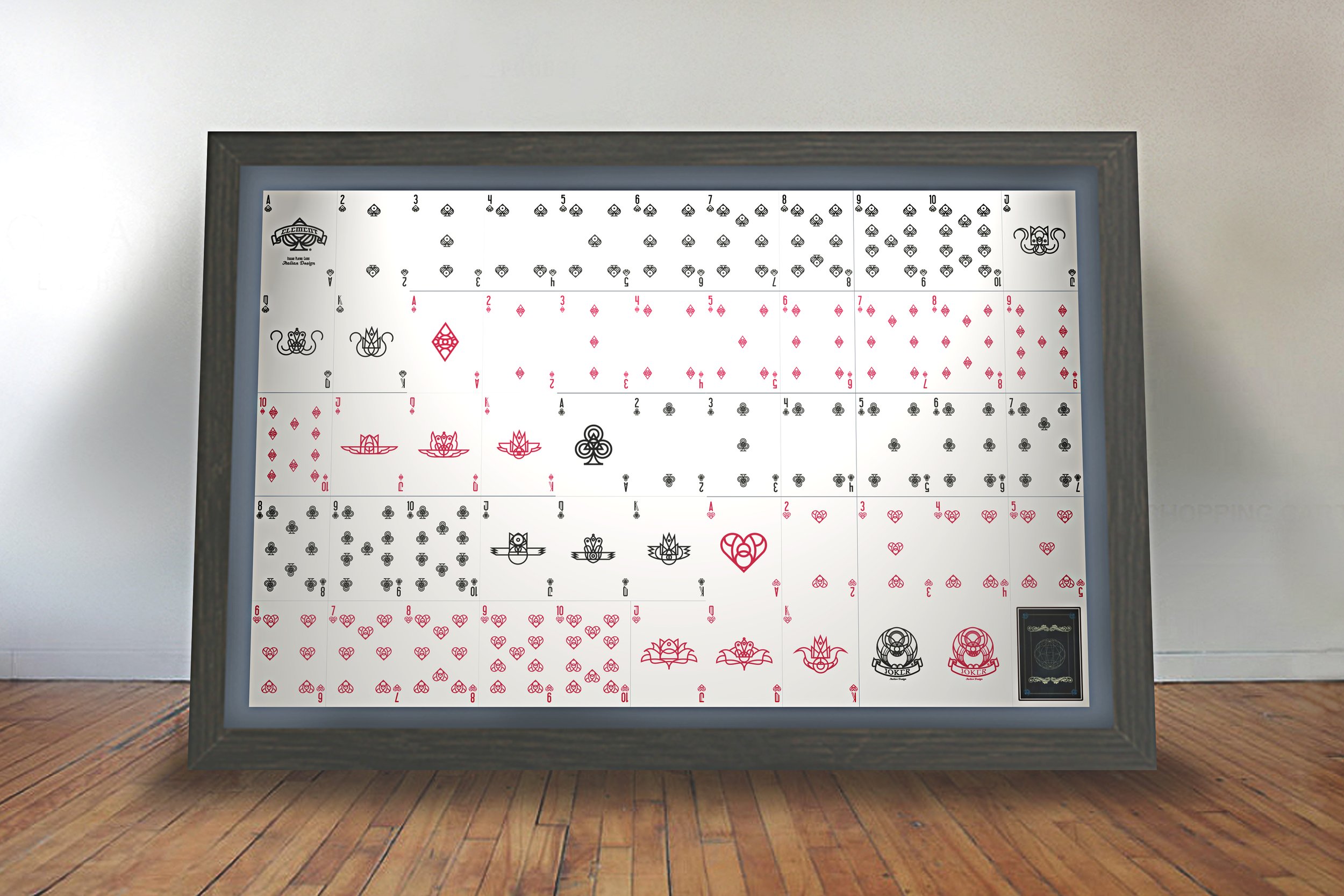 Large framed wall poster of playing cards, including the Ace, King, Queen, Jack, and numbered cards from 2 to 10 in hearts, diamonds, clubs, and spades suits, displayed on a wall.