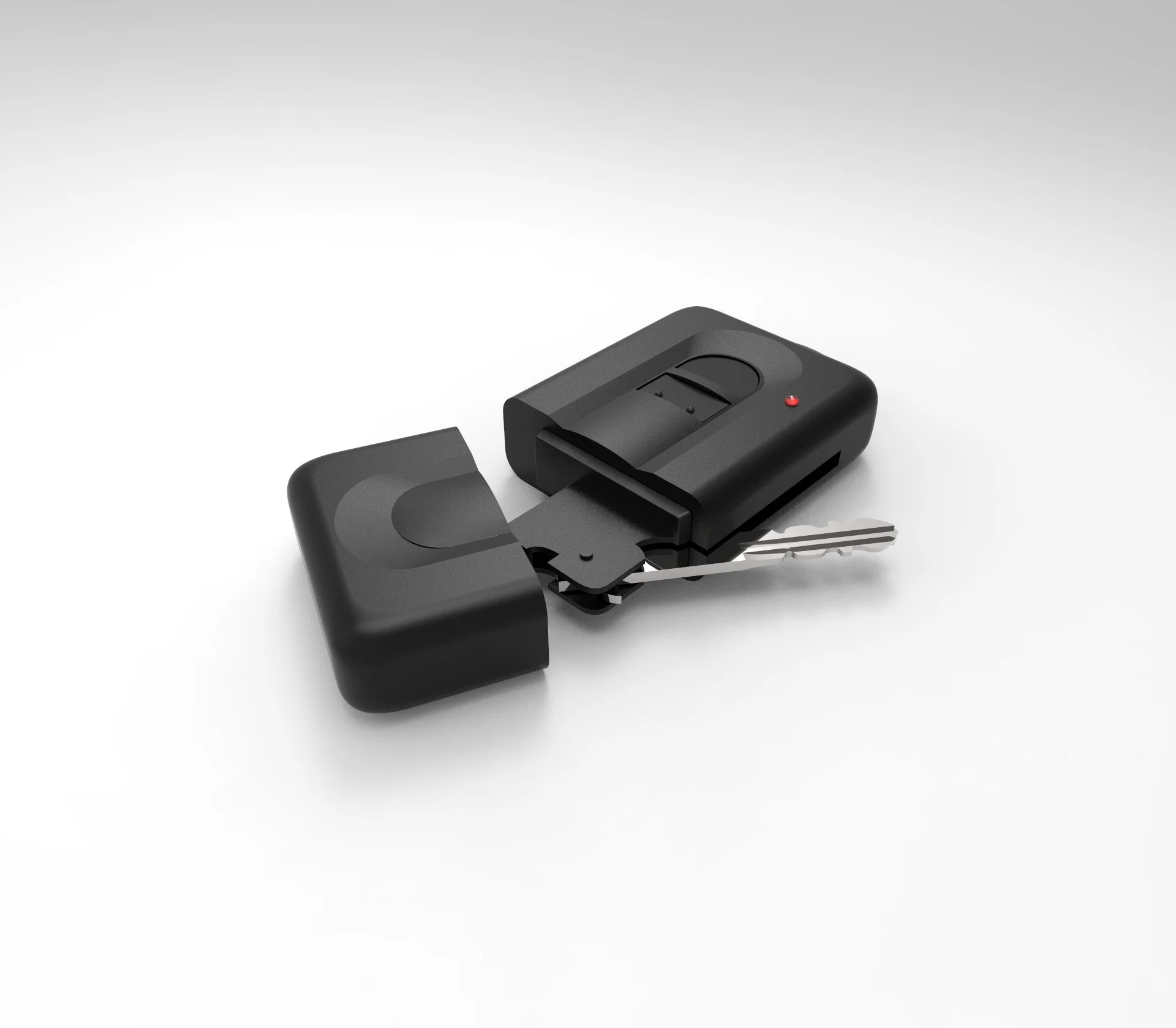 Wireless car key fob with a key attached, placed on a plain white surface.