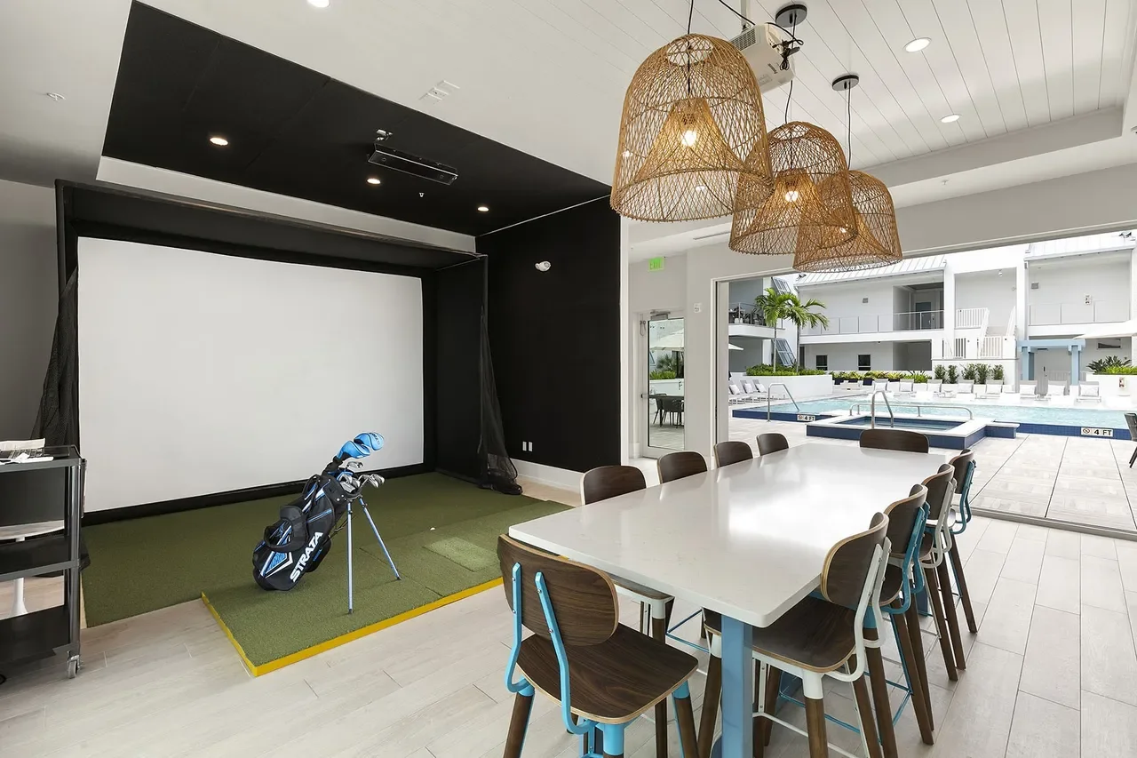 The Mark on 8th Old Naples golf simulator room
