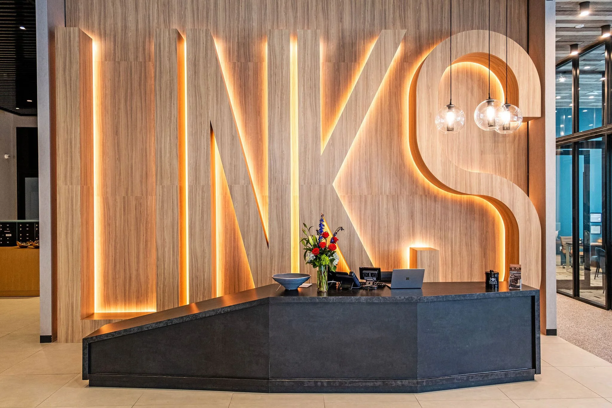 Aster and Links Sarasota FL lobby signage