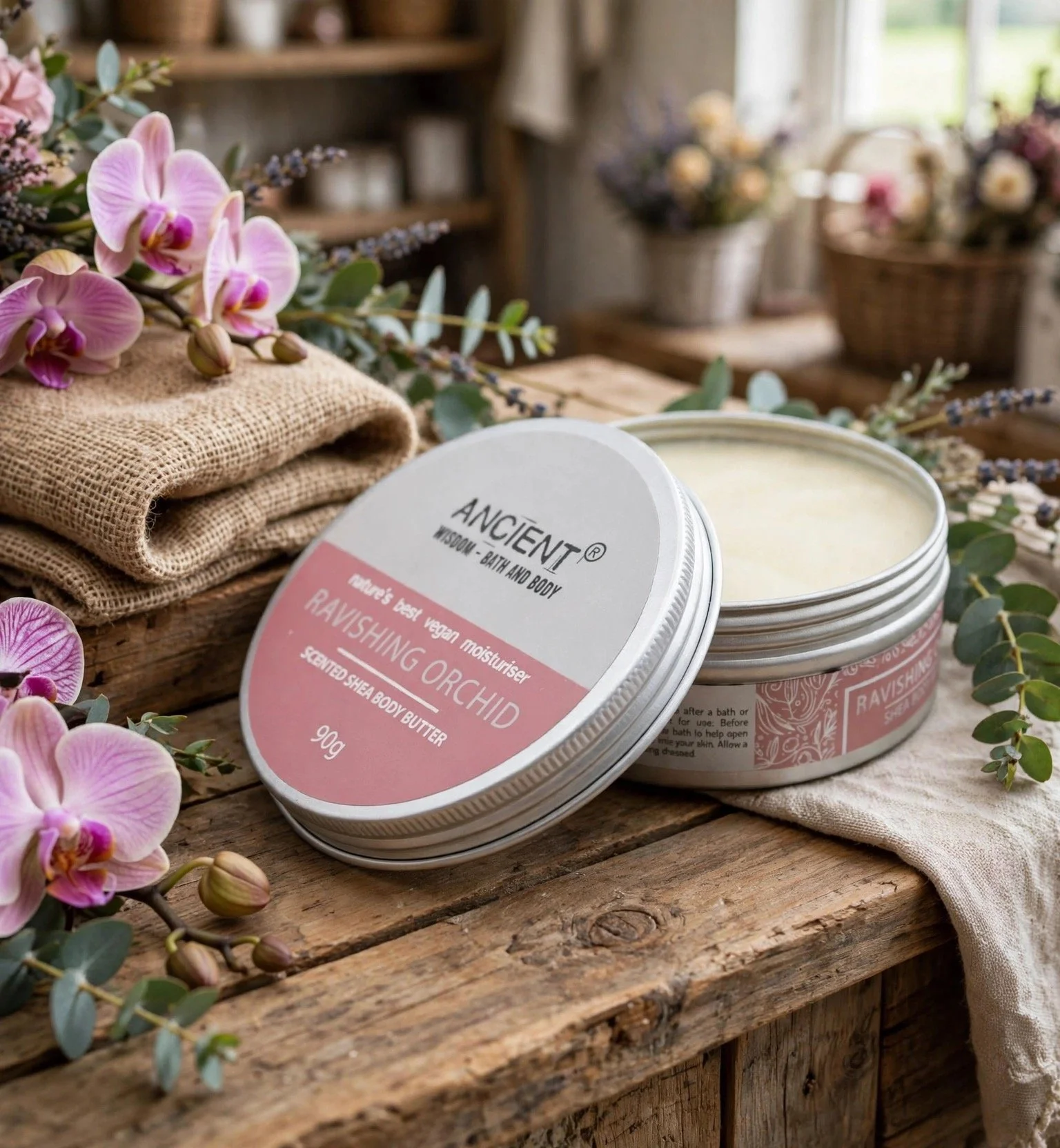 Open tin of Ravishing Orchid scented shea body butter
