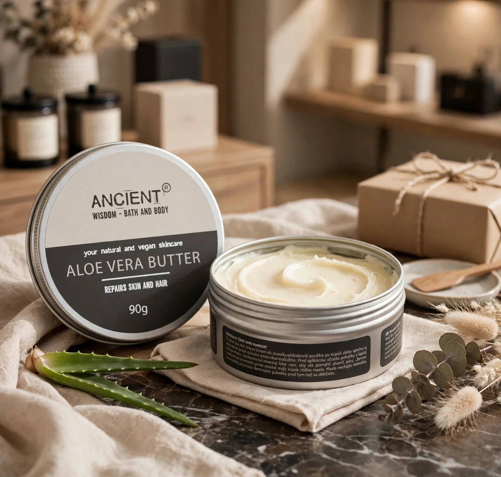 Open tin of pure aloe vera body butter