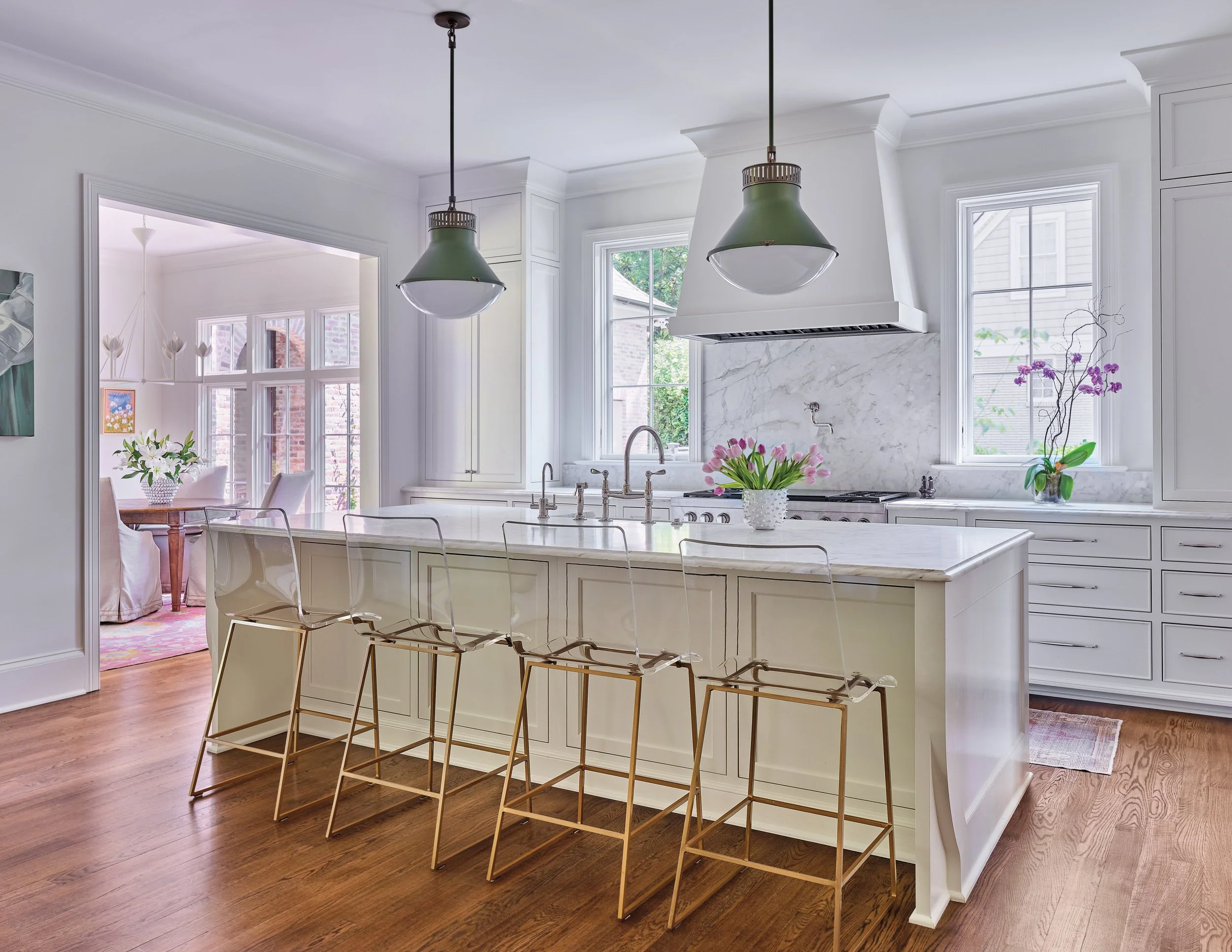 new construction custom kitchen design with large kitchen island, pendants and marble