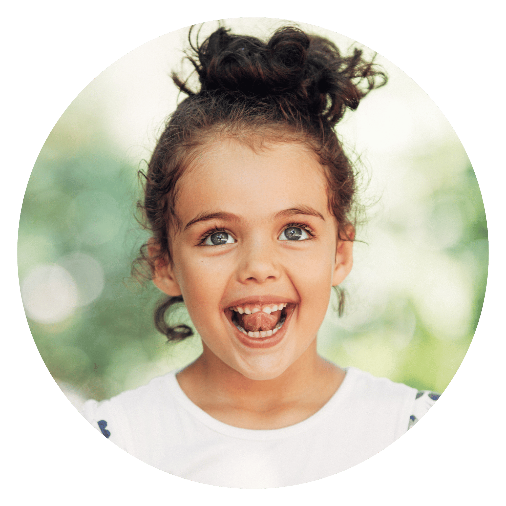 Young child smiling and practicing speech sounds