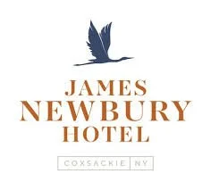 Logo of James Newbury Hotel in Coxsackie, NY, featuring a stylized bird in flight.
