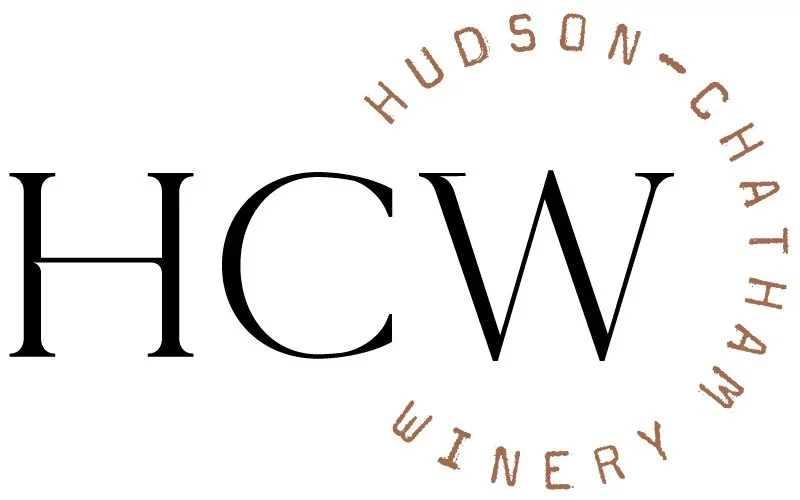 Logo with large black letters 'HCW' and the words 'Hudson - Chatham - Union' arranged in a semi-circle around the letters.
