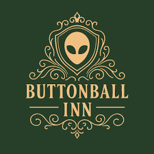 Logo for Buttonball Inn featuring an alien face within an ornate frame on a dark green background.
