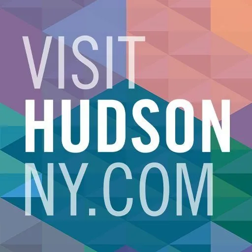 A colorful geometric background with the text "VISIT HUDSON NY.COM" in large white and purple letters.