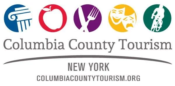 Columbia County Tourism logo with icons representing water, food, entertainment, theater, and outdoor activities, and text that reads "Columbia County Tourism, New York, columbiacountytourism.org".