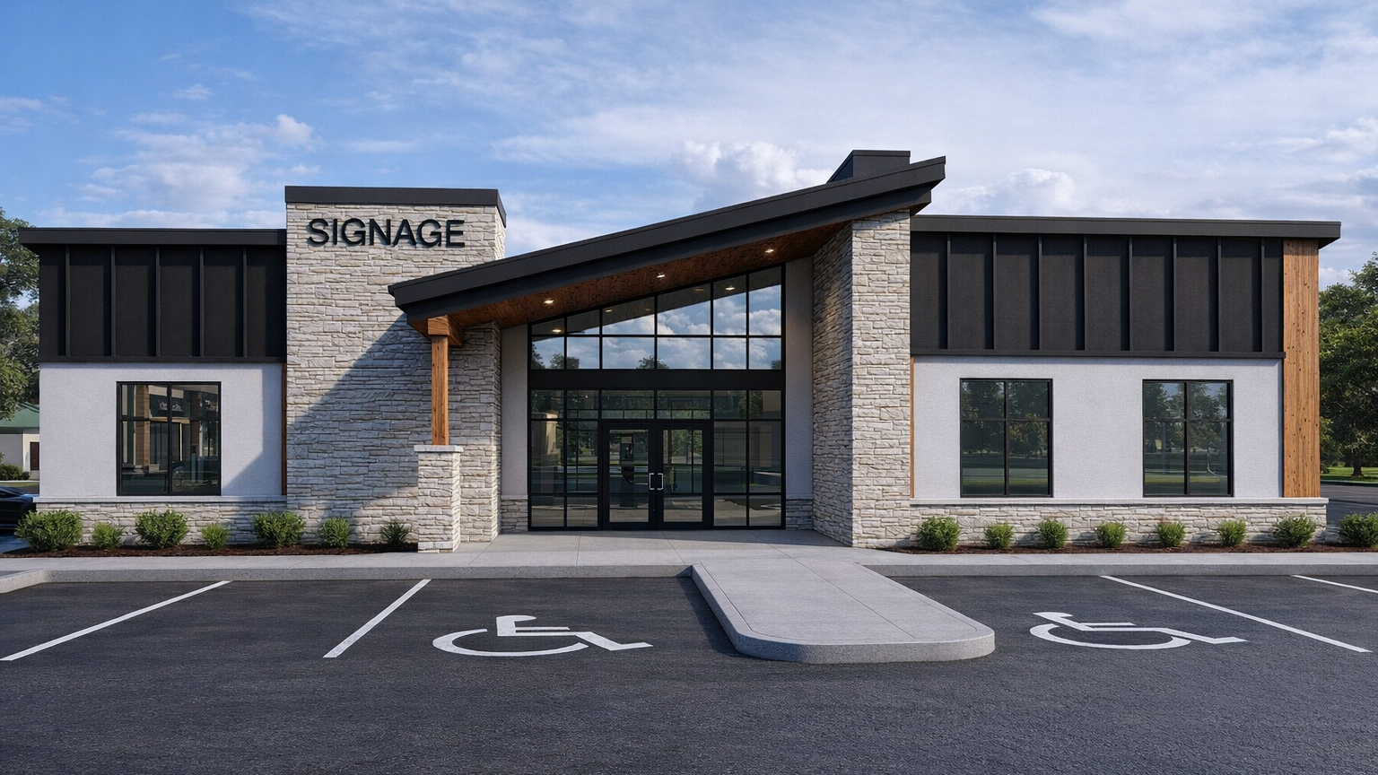 Modern building with a sign labeled 'Signage', large glass windows, and designated handicap parking spaces in front.