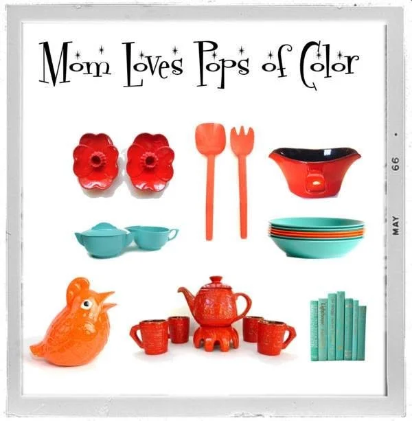 Colorful children's dishware and toys, including red flower-shaped cups, orange utensils, a red teapot with cups, teal bowls, a blue teacup set, an orange bird-shaped toy, and a set of teal books, with a caption that reads all in black whimsical font, "Mom Loves Pops of Color."